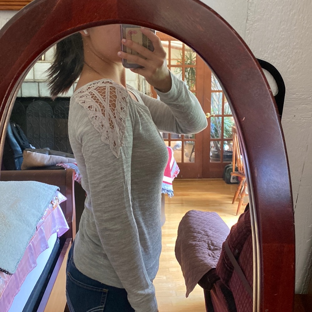 Cute grey knit top with shoulder detailing
